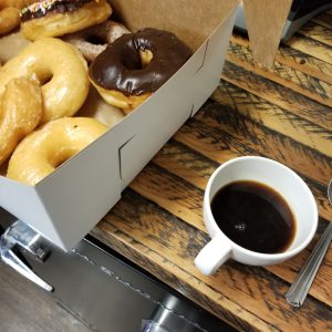 Drip Coffee and Donuts on a Table