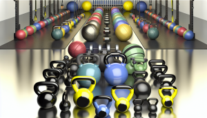 A picture of kettle bells and various weights