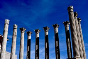 Ancient columns against a blue sky